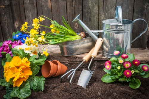 Team member preparing tools before garden job
